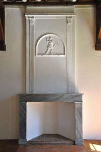 view of the stucco above the fireplace in the salon on the first floor of the 17th century wing.